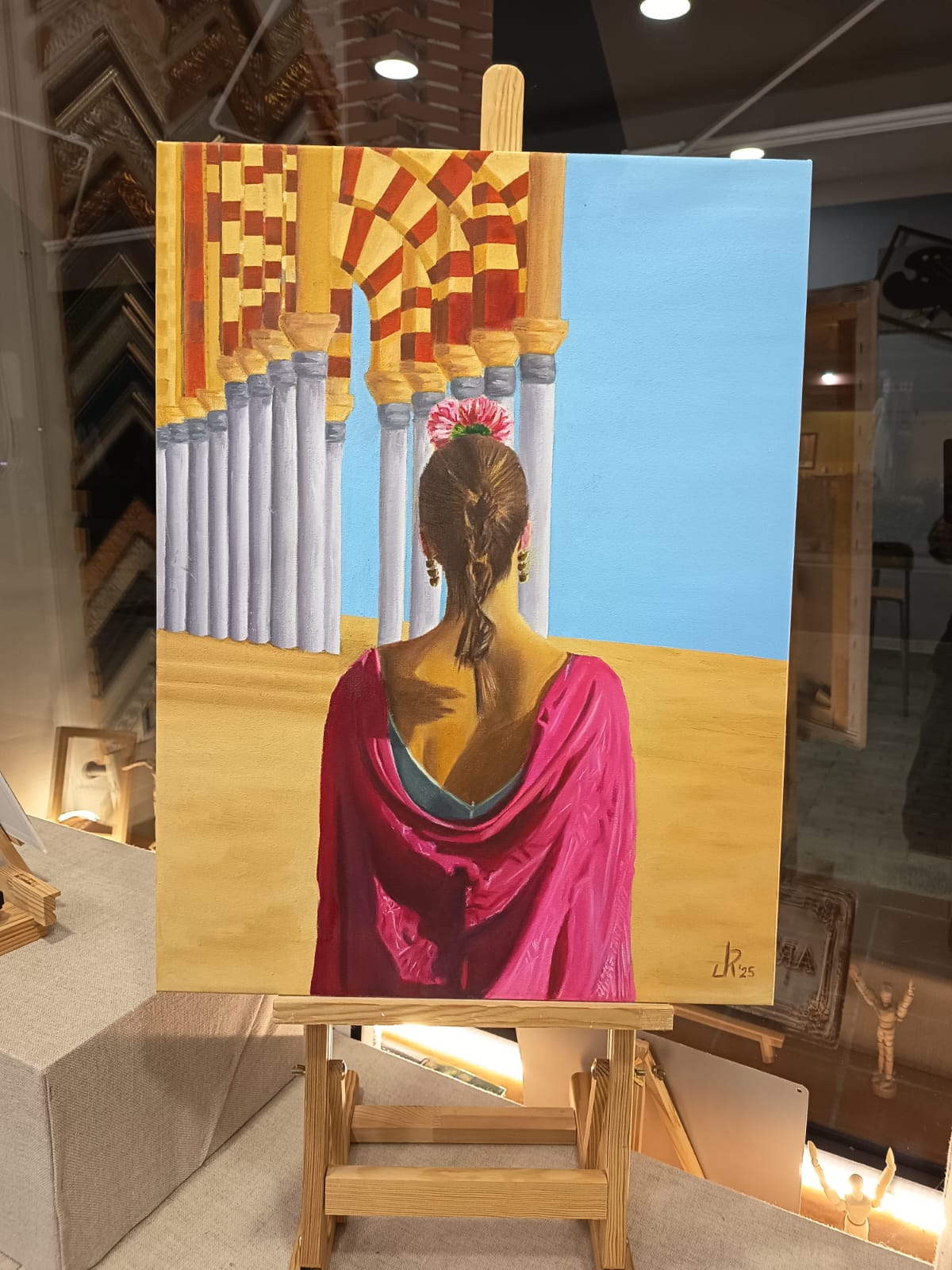 Pintura al óleo de mujer en templo de India